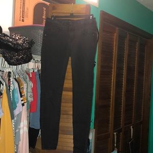 Low-rise black jeans